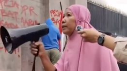 Terungkap Sosok Ibu Kerudung Pink yang Viral, Keluarga: Dia Butuh Perhatian Khusus