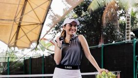 Marsha Aruan tengah kecanduan main tenis.