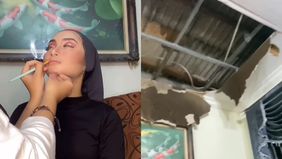 Seorang perempuan yang wajahnya sedang di make up malah ketiban air dari atap rumah karena plafon bocor. 