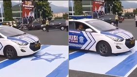 Ramai di media sosial memperlihatkan sebuah video ketika mobill patroli dan pengawal (Patwal) Polri melindas bendera Israel yang dibentangkan di atas aspal. Aksi pemobil patwal polisi itu pun langsung ramai menjadi perbincangan usai diunggah akun Ins