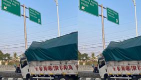 Truk tersebut nyangkut di pemisah jalur flyover.