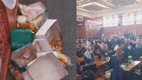 Nampak tumpukan bos bekas makanan ditinggal di ruang sidang.