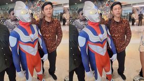 Anggota DPR terpilih periode 2024-2029, Jamaludin Malik, mengenakan kostum Ultraman menjelang pelantikan.