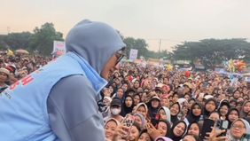 Paula nampak cantik dan bahagia.