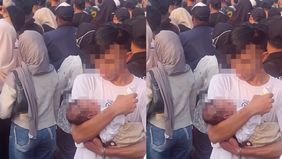 Sebuah video baru-baru ini viral di media sosial, seorang pria membawa bayi yang diduga baru lahir di tengah kerumunan konser musik.