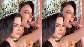 Miss Grand India dan Brazil nampak asik menikmati pisang goreng.