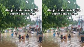 Genangan air sepinggang orang dewasa.
