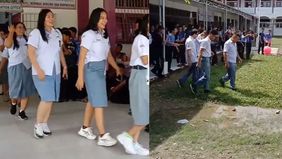 Para guru di SMA Swasta Kristen BNKP Gunungsitoli merayakan Hari Guru Nasional dengan mengenakan seragam putih abu-abu layaknya siswa SMA, mengundang kegembiraan dan apresiasi online.