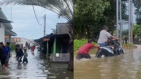 Banjir rob kembali melanda kawasan pemukiman warga di Kampung Tanah Baru Kapling Pondok Dua, Babelan, Bekasi pada Minggu, 15 Desember 2024.