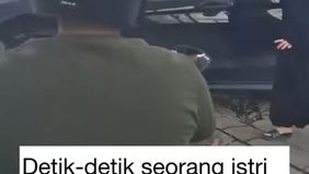 Tampak seorang istri berusaha menghentikan mobil yang diduga milik suaminya. Mobil tersebut konon digunakan oleh suaminya untuk membawa selingkuhannya, dan kebetulan bertemu dengan sang istri.