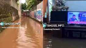 Hujan deras yang mengguyur wilayah Pamulang, Tangerang Selatan (Tangsel), menyebabkan banjir di sejumlah titik pada Senin, 10 Maret 2025. Salah satu lokasi terdampak parah adalah Jalan Kemuning III, yang terendam air setinggi 50 sentimeter.