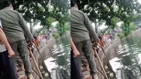 Penemuan mayat seorang pria paruh baya di Kali Kresek ujung gang Lagoa Terusan gg VI, Lagoa, Koja, Jakarta Utara.