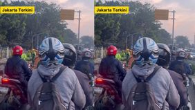 Laporan Jakartans terkait adanya pengecoran jalan di Jalan Raya Bogor depan Pasar Induk Kramat Jati, Jakarta Timur pagi tadi, Kamis (12/6/2025). Aktivitas tersebut menyebabkan arus lalu lintas terpantau macet.