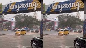 Banjir di Bates Kreo, Jalan Hos Cokroaminoto, Larangan, Tangerang, Selasa (12/8/2025) pukul 15.30 WIB.