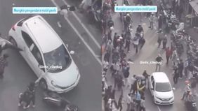 Sebuah mobil Honda Brio berwarna putih dengan pelat nomor B 1465 HKK menjadi sasaran amukan massa saat nekat melintas di tengah kerumunan aksi demo di kawasan Pejompongan, Tanah Abang, Jakarta Pusat, Senin, 25 Agustus 2025