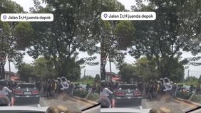 Kecelakaan lalu lintas terjadi pada siang hari sekitar pukul 12.00 WIB di Jalan Juanda, Depok, tepatnya di dekat SPBU arah Margonda. Seorang korban dilaporkan tergeletak di tengah jalan dengan kondisi mengalami luka berdarah.