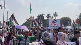 Suasana kawasan Patung Kuda, Kecamatan Gambir, Jakarta Pusat, pada Minggu, 12 Oktober 2025 dipenuhi teriakan “Free Palestine” dan kalimat takbir “Allahu Akbar” dari ribuan peserta aksi bela Palestina bertajuk Indonesia Tolak Genosida.