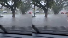 Hujan yang mengguyur wilayah Makassar, menyebabkan banjir di Jalan Poros Perintis Kemerdekaan, tepatnya di sekitar area Polda Sulsel, Jumat, 31 Oktober 2025.