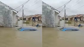 Banjir besar kembali melanda Tambun Utara, Kabupaten Bekasi, Jawa Barat, dan melumpuhkan aktivitas warga. Luapan air merendam Jalan Raya Sukamekar, satu-satunya akses menuju sejumlah kawasan permukiman, sekaligus menenggelamkan perumahan subsidi deng
