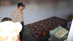 Menteri Koordinator Bidang Infrastruktur dan Pembangunan Kewilayahan Agus Harimurti Yudhoyono meninjau dan menyalurkan bantuan logistik di daerah bencana, Aceh Tamiang.