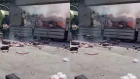 Kebakaran melahap truk paket yang terjadi di kawasan gudang Shopee SPX, Jalan Randu Garut, Kecamatan Tugu, Kota Semarang, pada Sabtu, 14 fEBRUARI 2026 sekitar pukul 10.50 WIB.