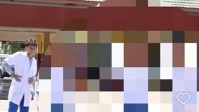 Korban tengah ujian praktik sains.