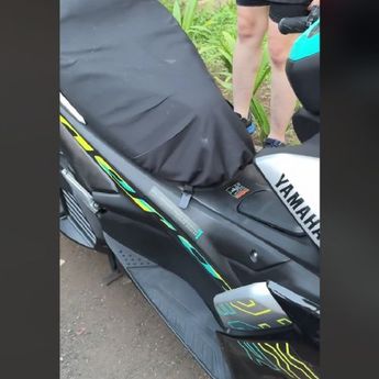 Viral: Pengunjung GBK Kehilangan Helm di Area Parkir