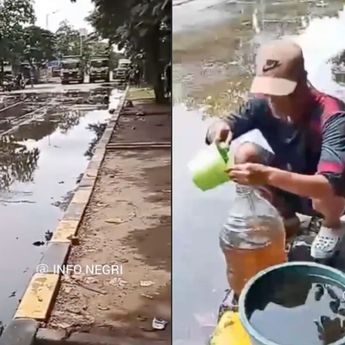 Minyak Tumpah di Jalan KBN Marunda, Warga Berbondong-Bondong Tampung