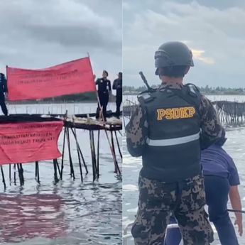 Petugas Bersenjata Lengkap dari KKP Segel Pagar Laut Misterius Sejauh 30 KM di Tangerang