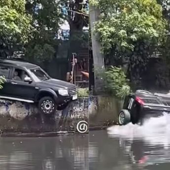 Detik-detik Mobil Hitam Nyemplung ke Kali saat Proses Derek