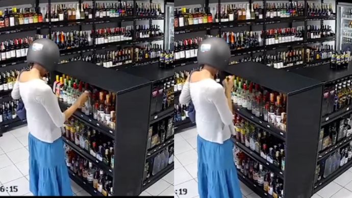 Seorang bule cantik yang terekam CCTV melakukan aksi pencurian di sebuah toko minuman wine di Seminyak, Bali