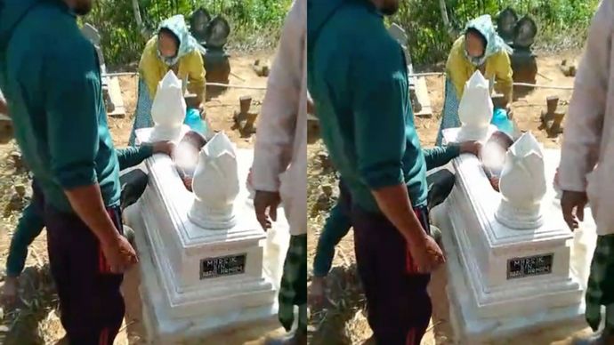 Viral Bocah Nyangkut di Makam