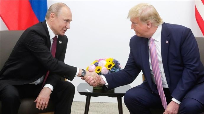 Presiden Rusia Vladimir Putin dan Donald Trump.