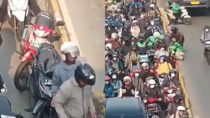 Motor mobil terjebak di jalur busway cengkareng