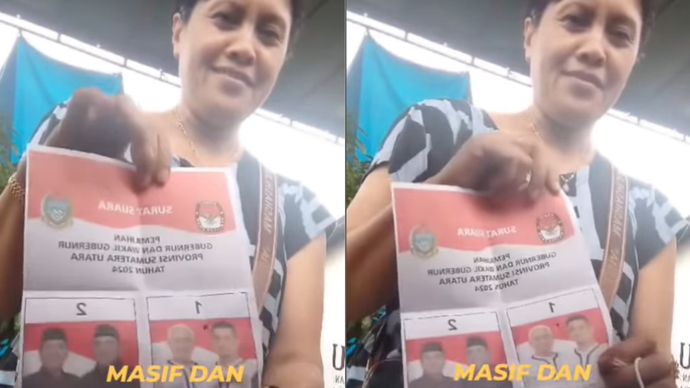 Wanita Coblos 2 Surat Suara di Pilkada Sumut