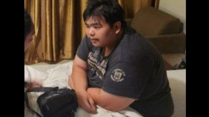 George Sugama Halim, anak bos toko roti penganiaya pegawai, saat ditangkap petugas. 