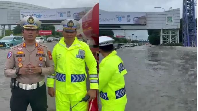 Suasana banjir di Tol Bandara Prof. Dr. Sedyatmo Km. 31+200 arah Bandara Soekarno-Hatta.