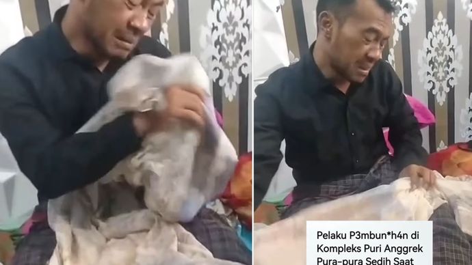 Wadison Pasaribu (37) berpura-pura menangis saat melihat j&euml;n4z*h istrinya Petry Sihombing (35) di rumah duka yang berlokasi di Kompleks Puri Anggrek, Kelurahan Teritih, Kecamatan Walantaka, Kota Serang.