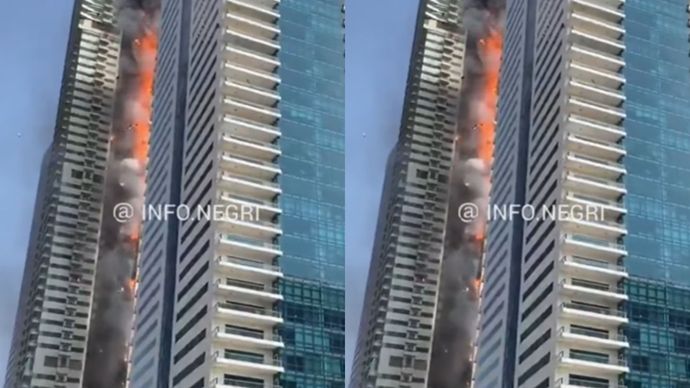 Ribuan orang mengungsi dari gedung pencakar langit saat petugas pemadam kebakaran berupaya memadamkan api yang membakar gedung Dubai Marina selama berjam-jam.