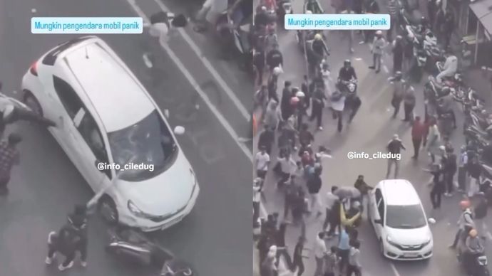 Mobil Brio putih jadi sasaran amukan massa pendemo.