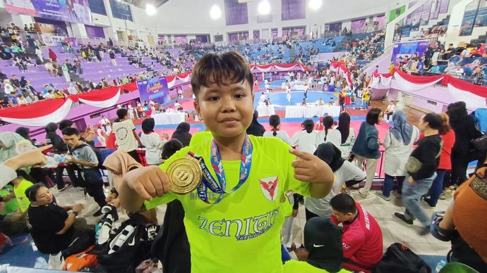 Iklil Kailani Arijaya meraih emas di Liga Taekwondo DKI Jakarta Series 11. 