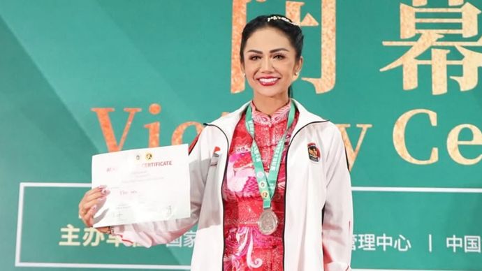 Kris Dayanti berhasil meraih juara dua di ajang 10th World Kungfu Championship
