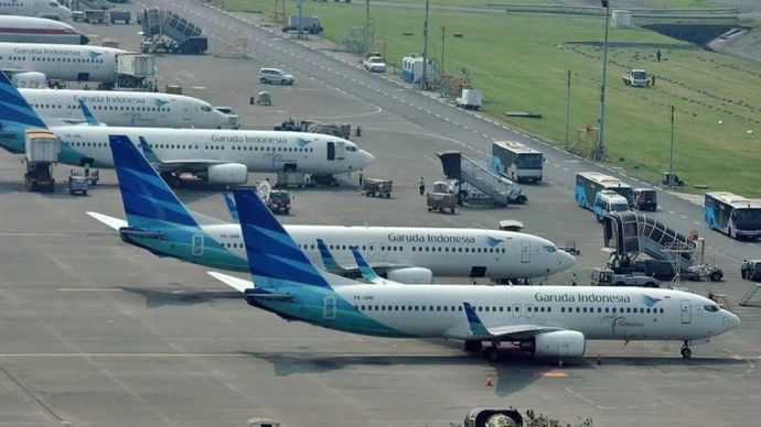 Ilustrasi - Deretan pesawat milik maskapai Garuda Indonesia terparkir di areal Bandara Internasional Soekarno Hatta, Tangerang, Banten. ANTARA FOTO/Lucky R/kye/aa.