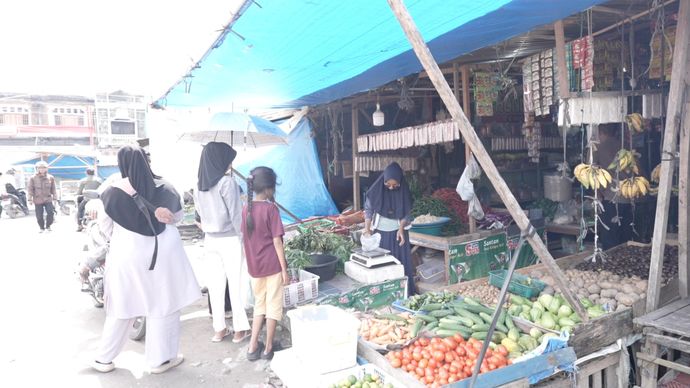 Pedagang pasar Lampahan pada Rabu, 31 Desember 2025.