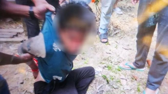Terduga pelaku R, pada saat diamankan tim gabungan. 