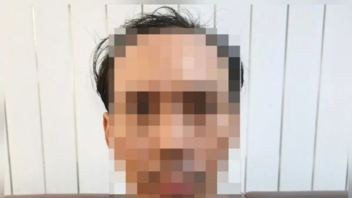 Seorang pria berinisial KM yang diduga terlibat dalam rangkaian kasus penganiayaan di lima lokasi berbeda di wilayah Kota dan Kabupaten Tangerang, saat ditangkap, Sabtu, 11 Juli 2026.