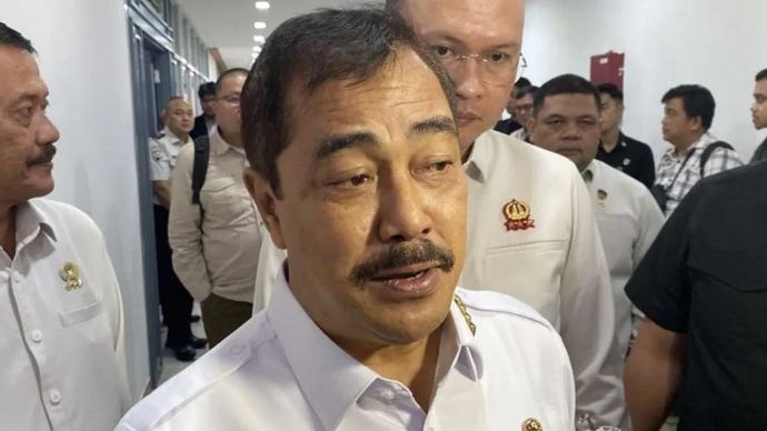 Menteri Imigrasi dan Pemasyarakatan Agus Adrianto saat memberi keterangan di kompleks parlemen, Jakarta, Selasa, 14 Juli 2026.