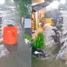 Viral! Aksi Pria Kejar Toren Air Hanyut Saat Banjir Bikin Netizen Ngakak