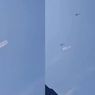Helikopter Bawa Bendera Latihan Melintas di Langit Jakarta