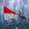 Gubernur Maluku Utara Sherly Tjoanda Kibarkan Merah Putih di Bawah Laut